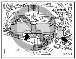 When checking or servicing in the engine compartment