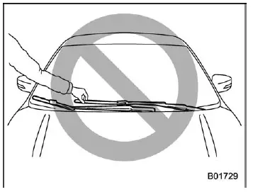 Subaru Ascent lifting windshield wiper arm for blade replacement
