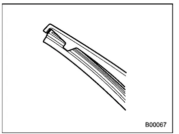 Subaru Ascent securing rear wiper blade rubber into plastic support with end stoppers