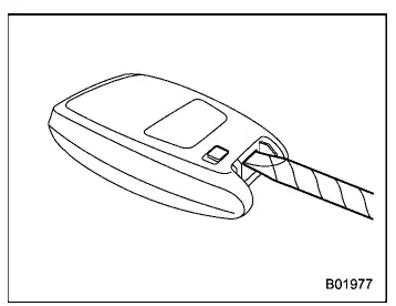 Subaru Ascent opening key fob cover using flat head screwdriver wrapped in cloth