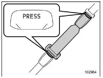 Subaru Ascent connecting seatbelt extender with aligned PRESS buttons