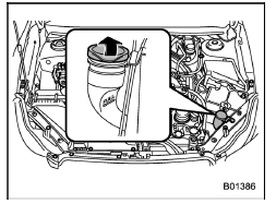 Adding the windshield washer fluid 